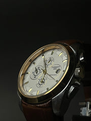 TISSOT COUTURIER CHRONOGRAPH STYLE STRAP WATCH.