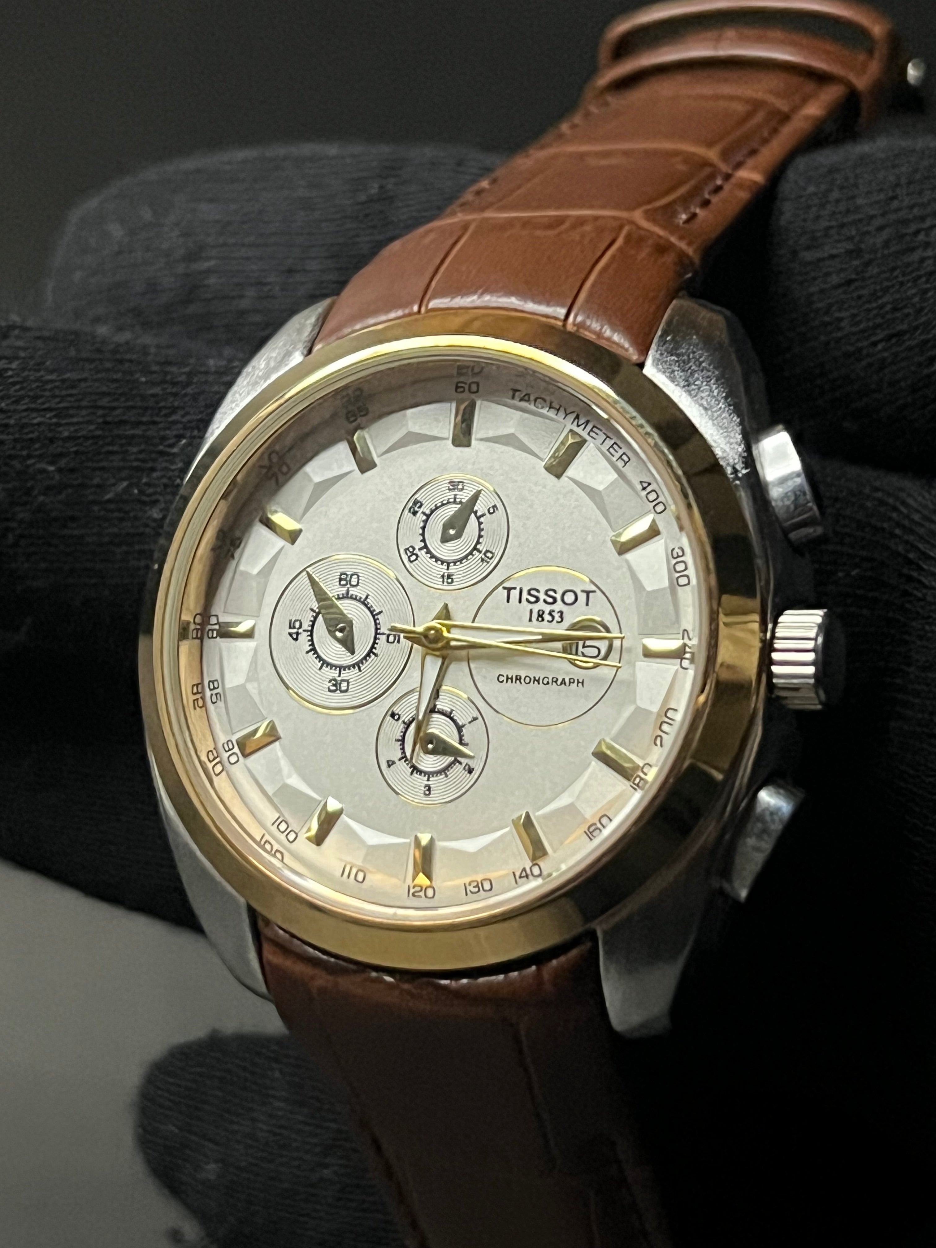 TISSOT COUTURIER CHRONOGRAPH STYLE STRAP WATCH.